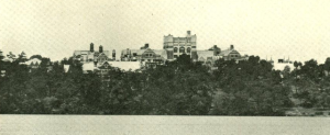 Wellesley College Hall from across lake Waban, before the fire.