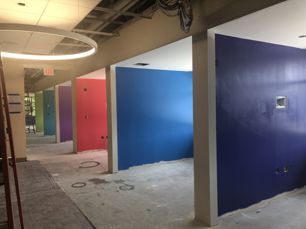 The second floor conference rooms, now painted their bright colors. The flooring and walls of the rooms haven't been installed yet.
