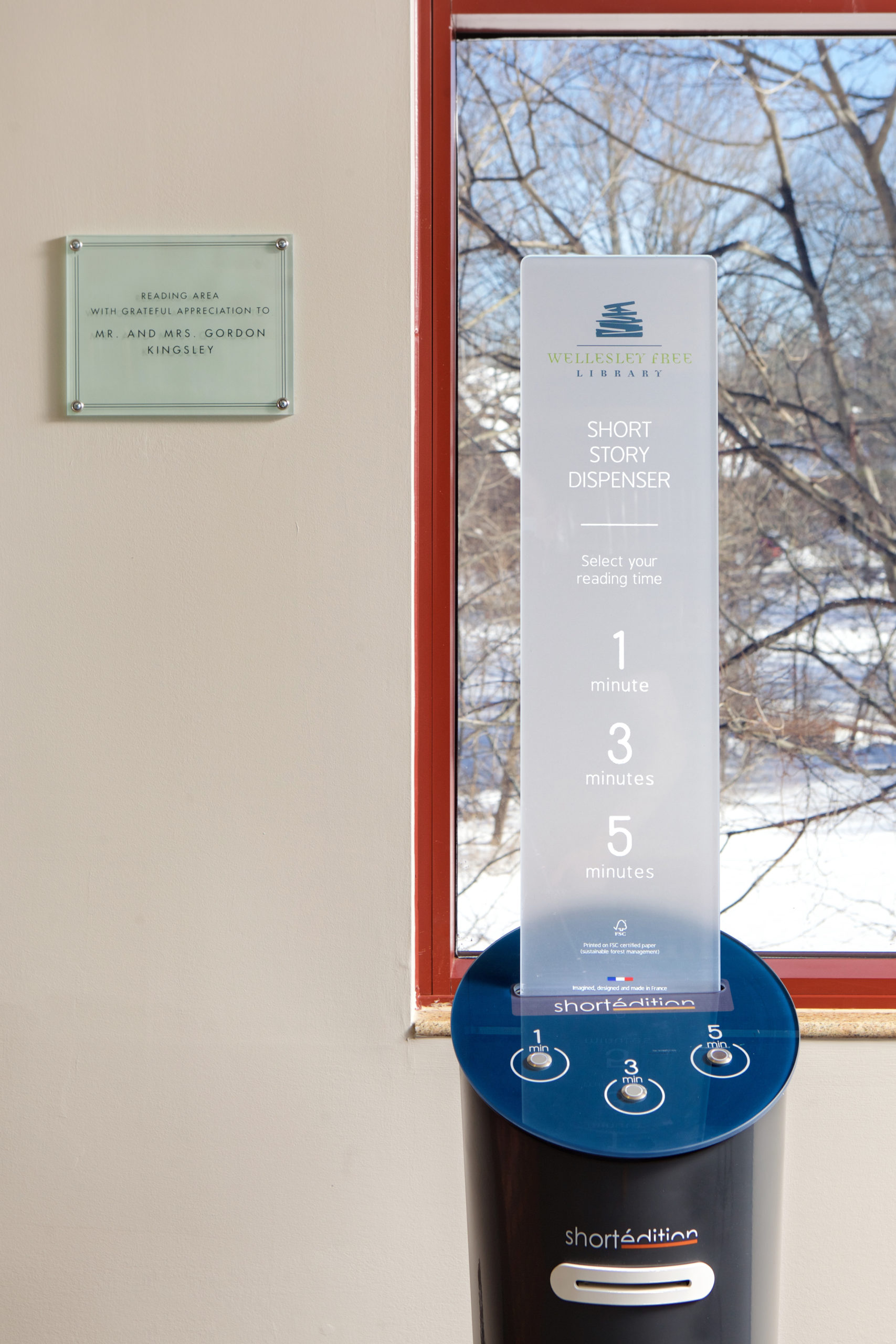 The Short Story dispenser from the front. It has three buttons, each corresponding to a different type of short story.