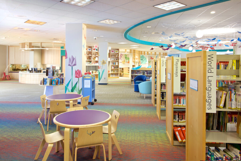 The new Children's Room and its child-sized tables. This view also shows more of the origami murals painted on the walls and pillars.