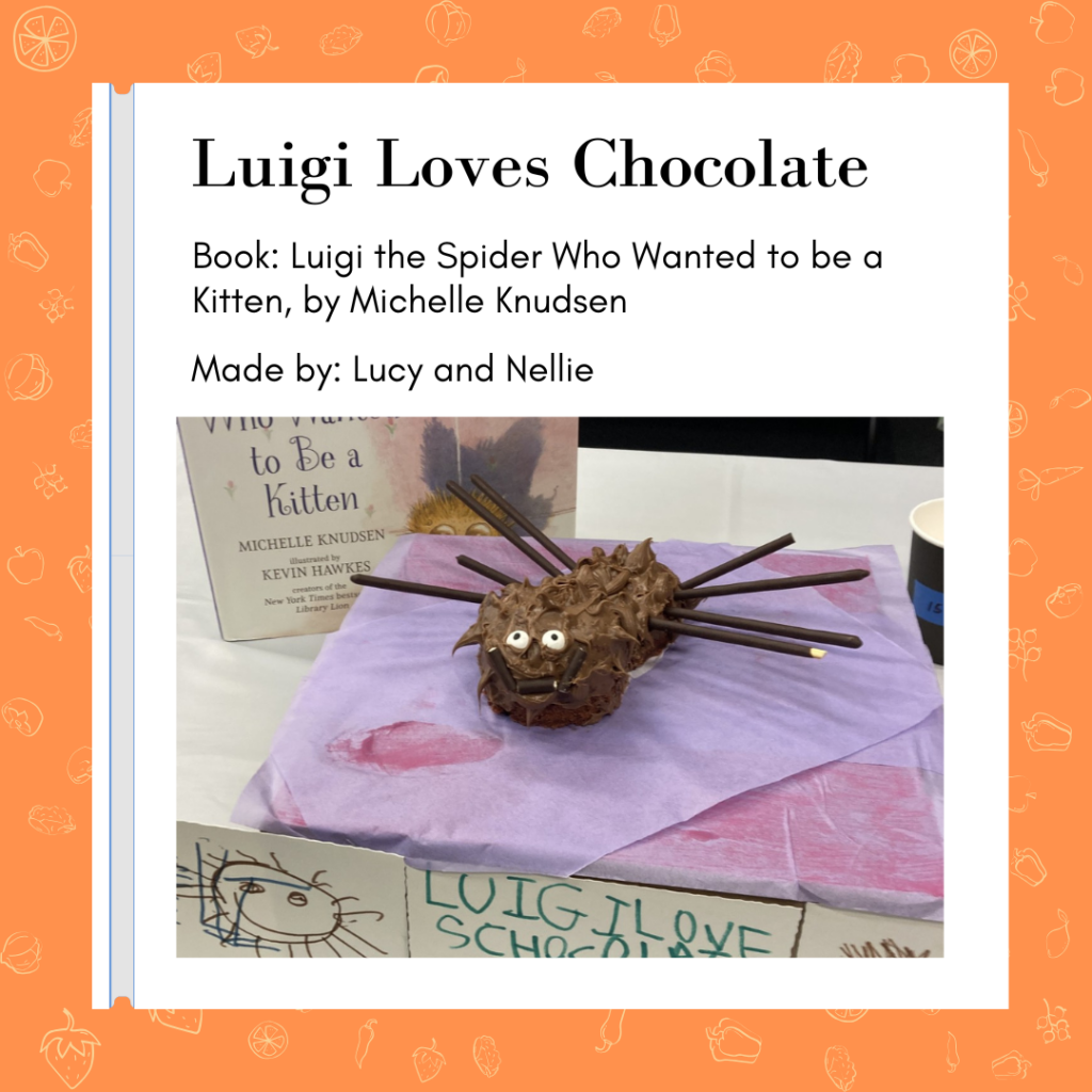 Spider-shaped cake iced in chocolate with chocolate sticks and edible eyes