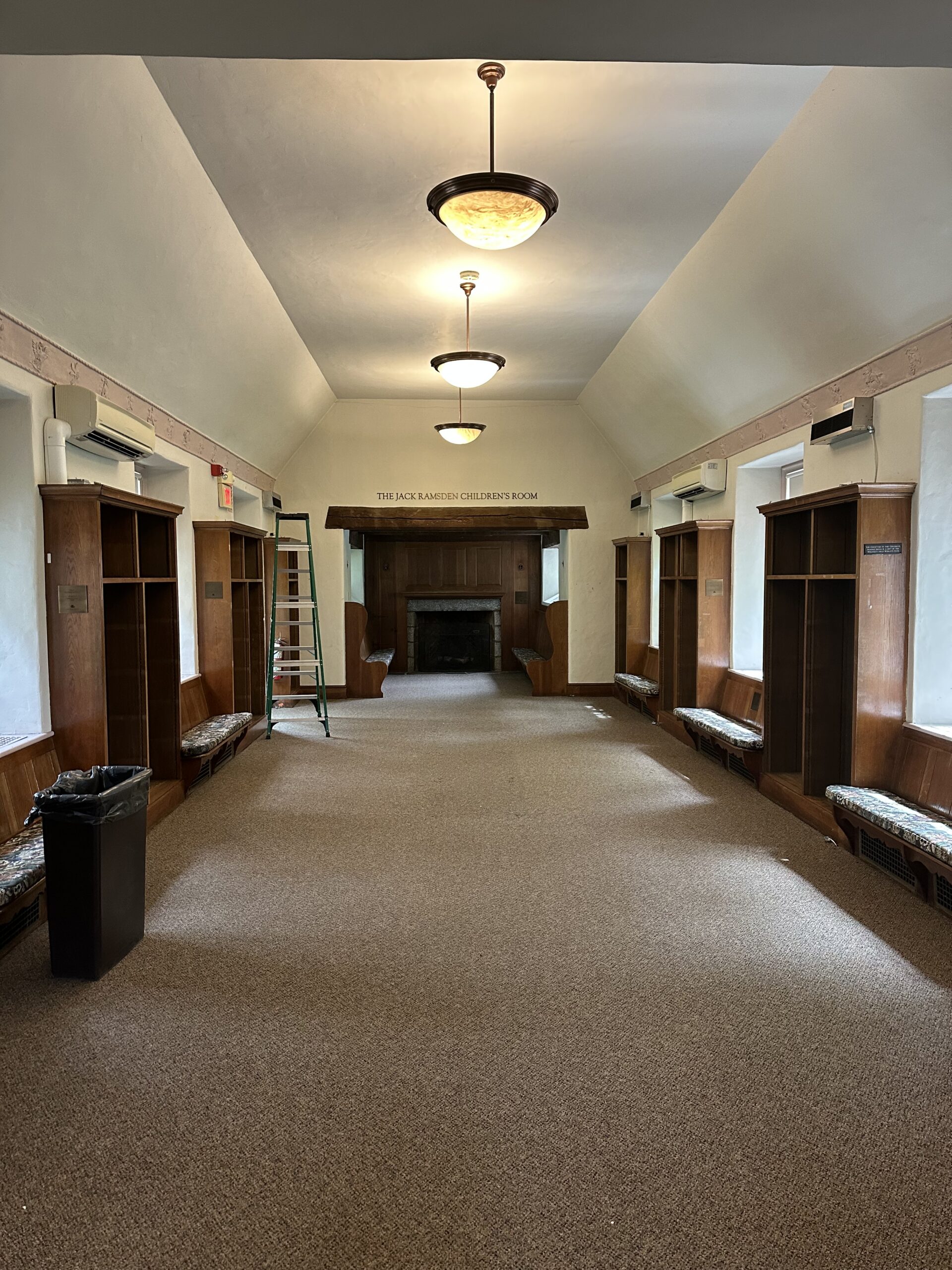 Library with empty shelves and no furniture.